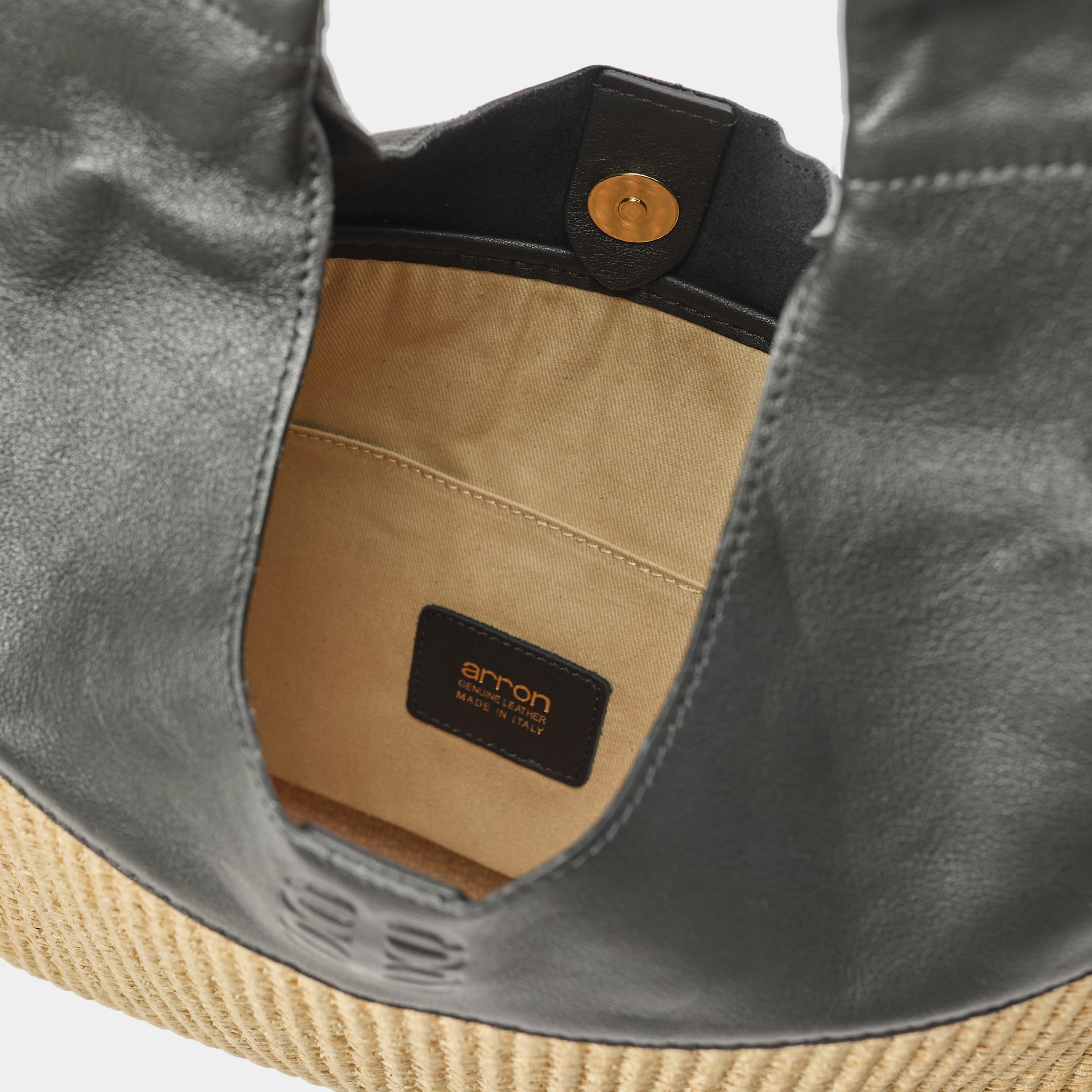 Borsa Arron in pelle nera e rafia naturale con fiocco a spalla