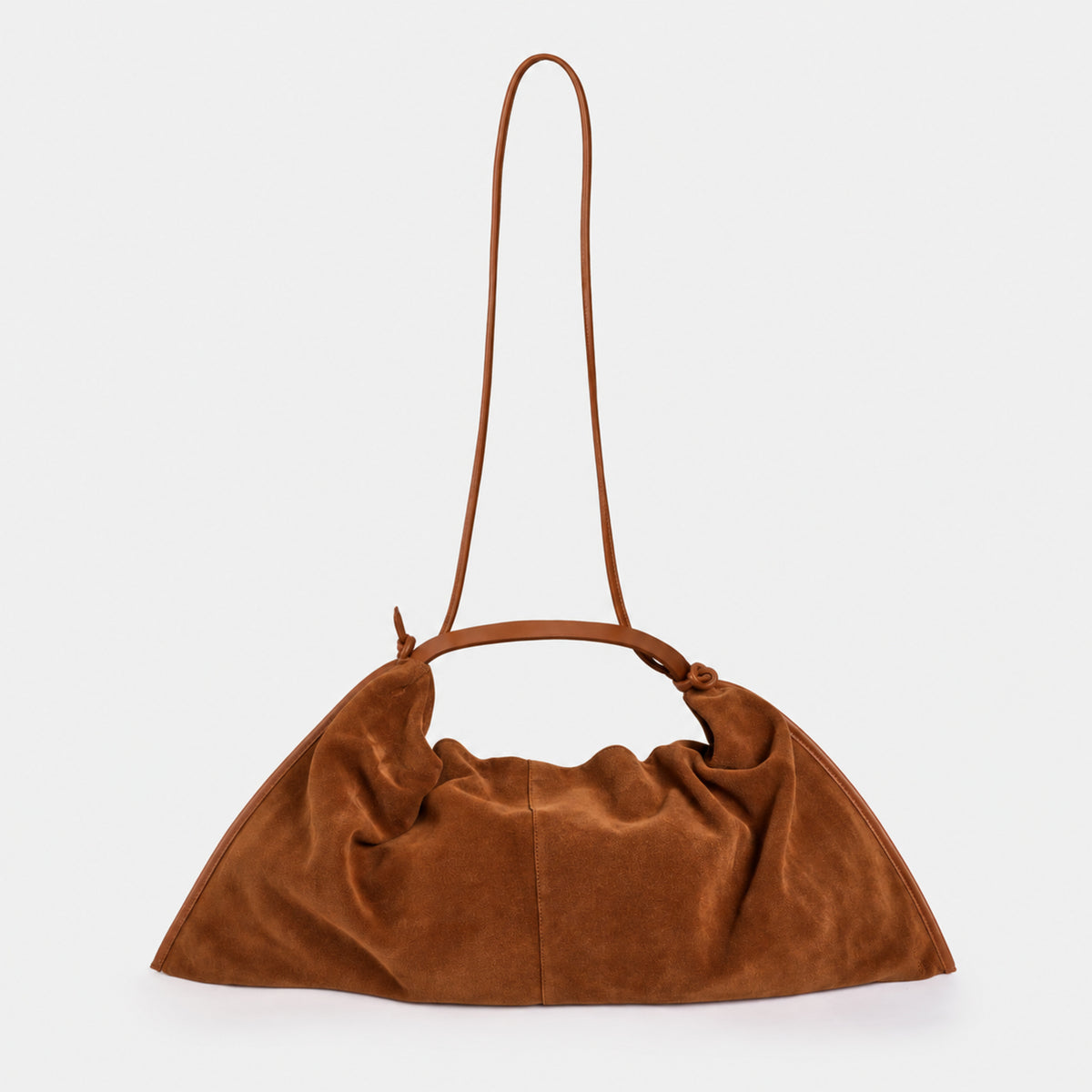 borsa destrutturata a tracolla e a spalla in camoscio cognac cammello design contemporaneo minimalista Arron Made in Italy