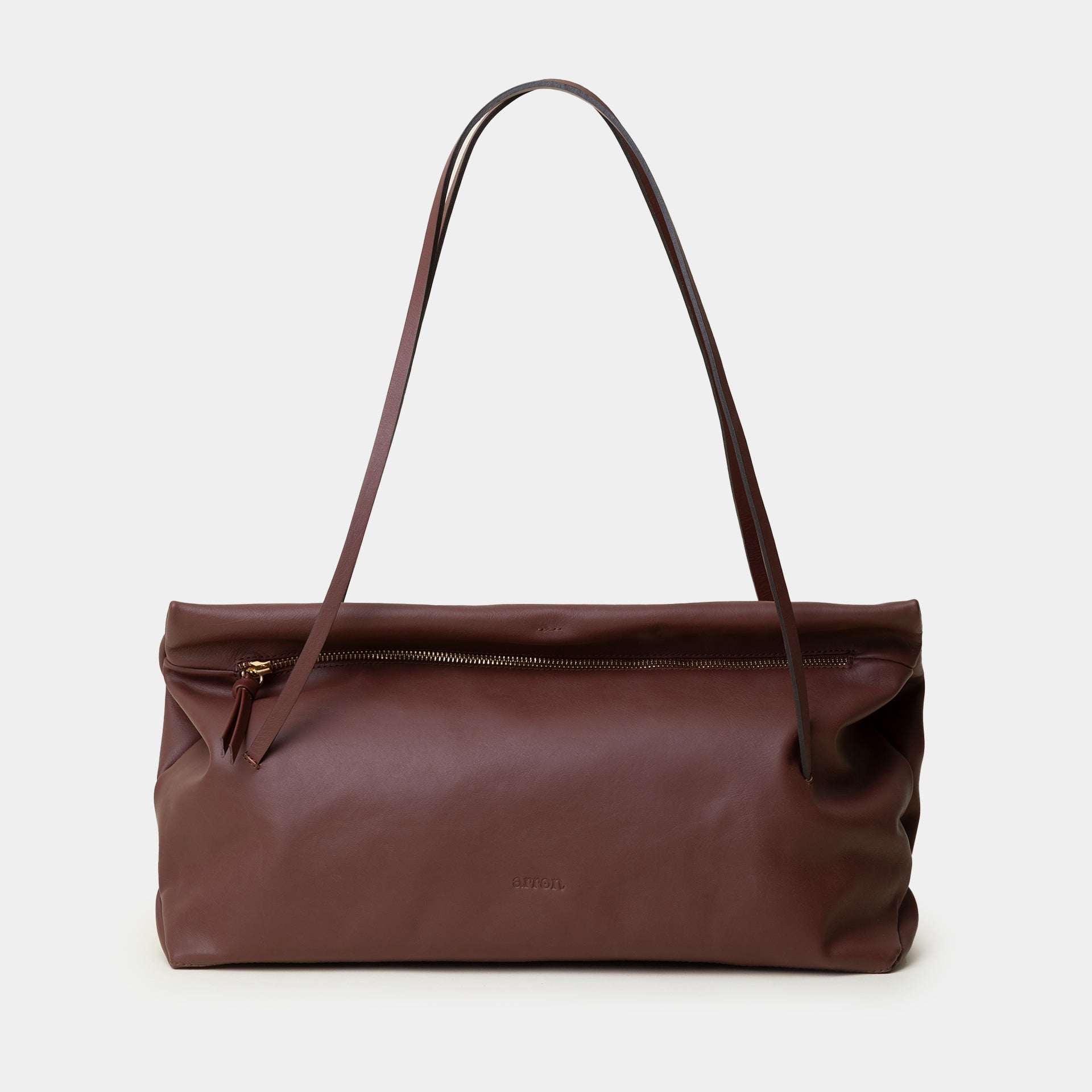 borsa east west baguette in pelle liscia color bruciato trendy minimalista marchio Arron made in Italy