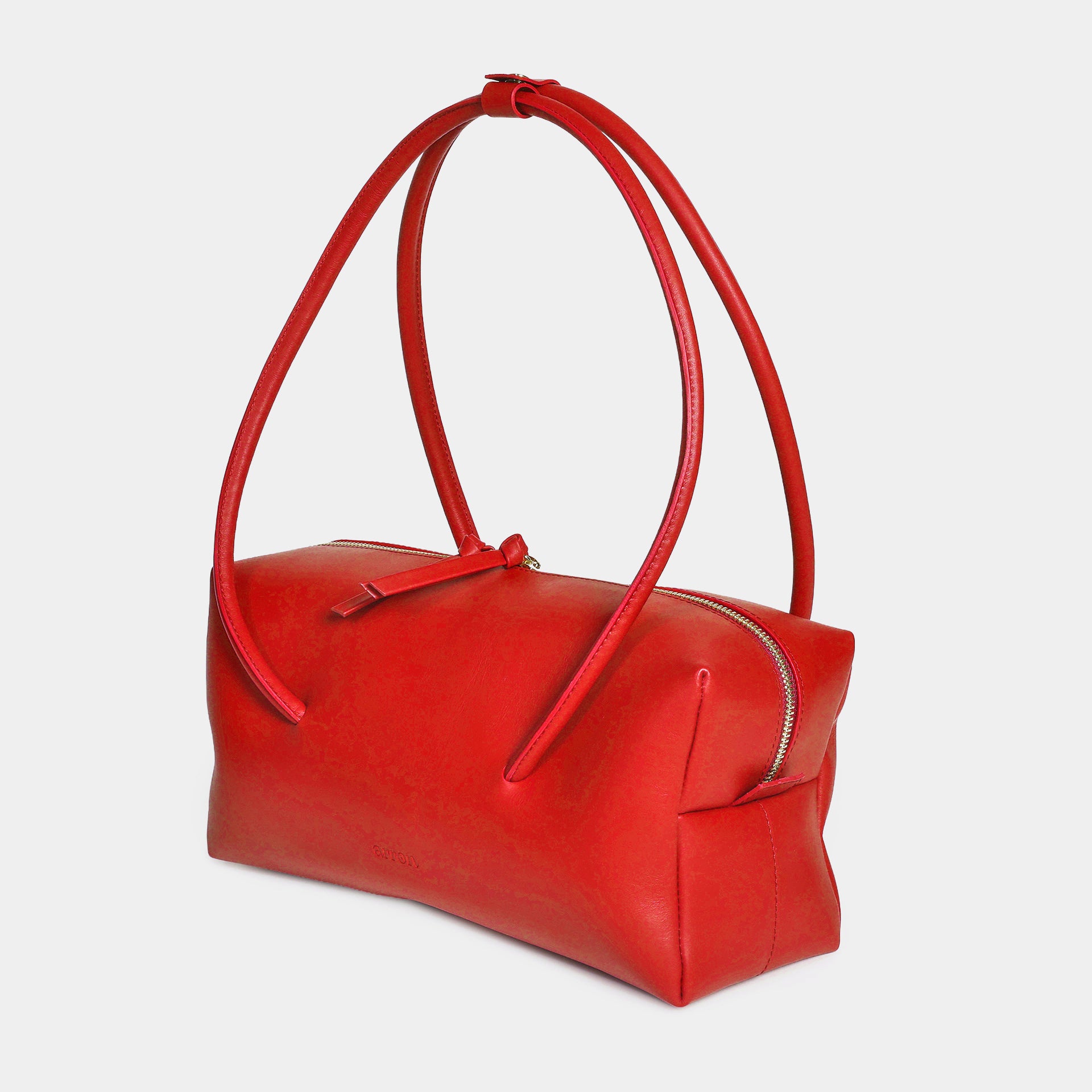 carol borsa scultorea e grafica east west in pelle rossa brand Arron Made in Italy laterale