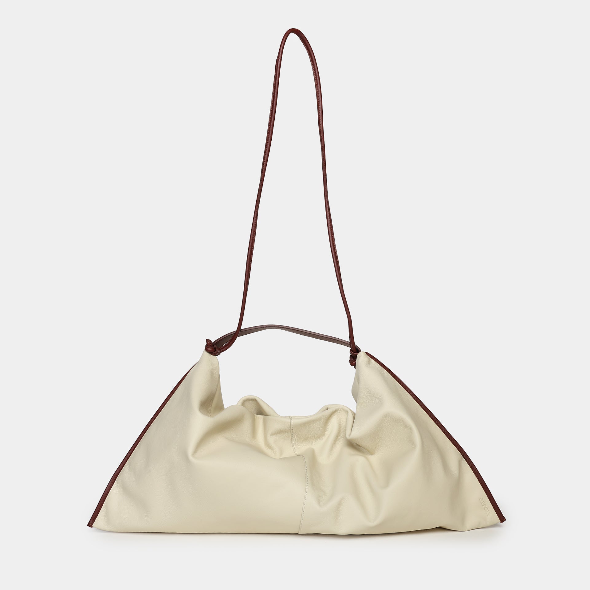 borsa Futura morbida destrutturata in pelle beige con bordi a contrasto marrone brand Arron made in Italy