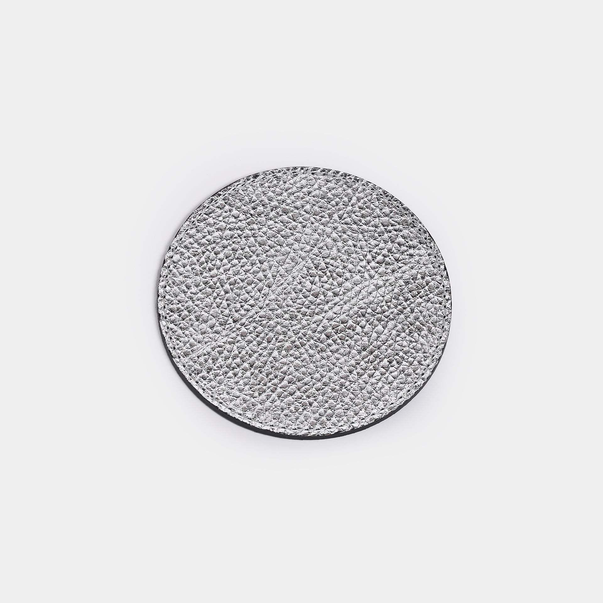 Sottobicchiere Giotto in pelle argento Arron, design elegante Made in Italy