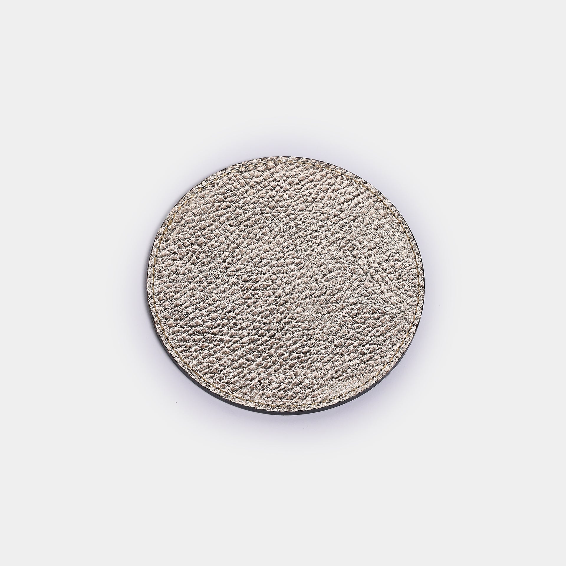 Sottobicchiere Giotto in pelle dorata Arron, design elegante Made in Italy