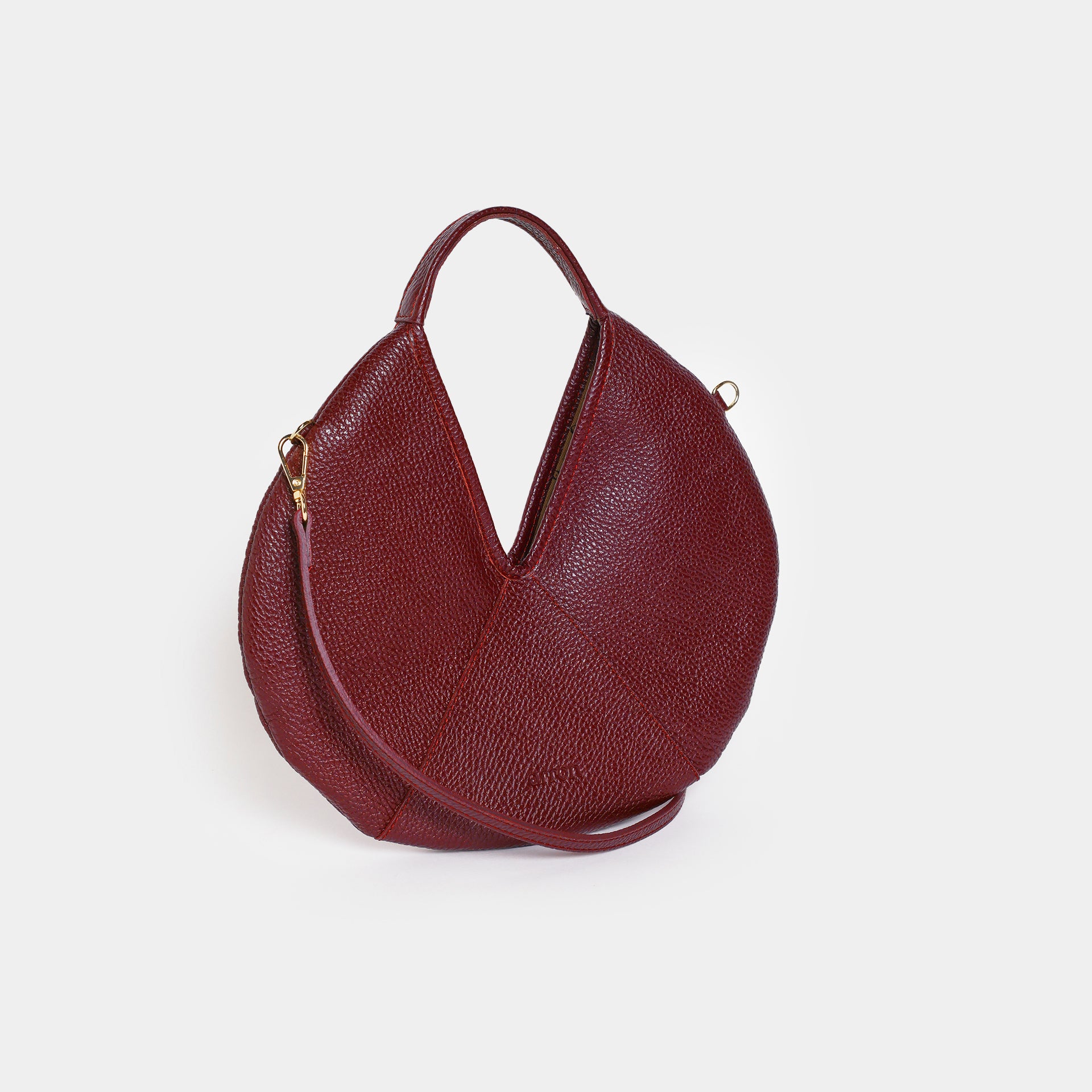 borsa rotonda piccola in pelle martellata bordeaux a tracolla brand Arron Made in Italy