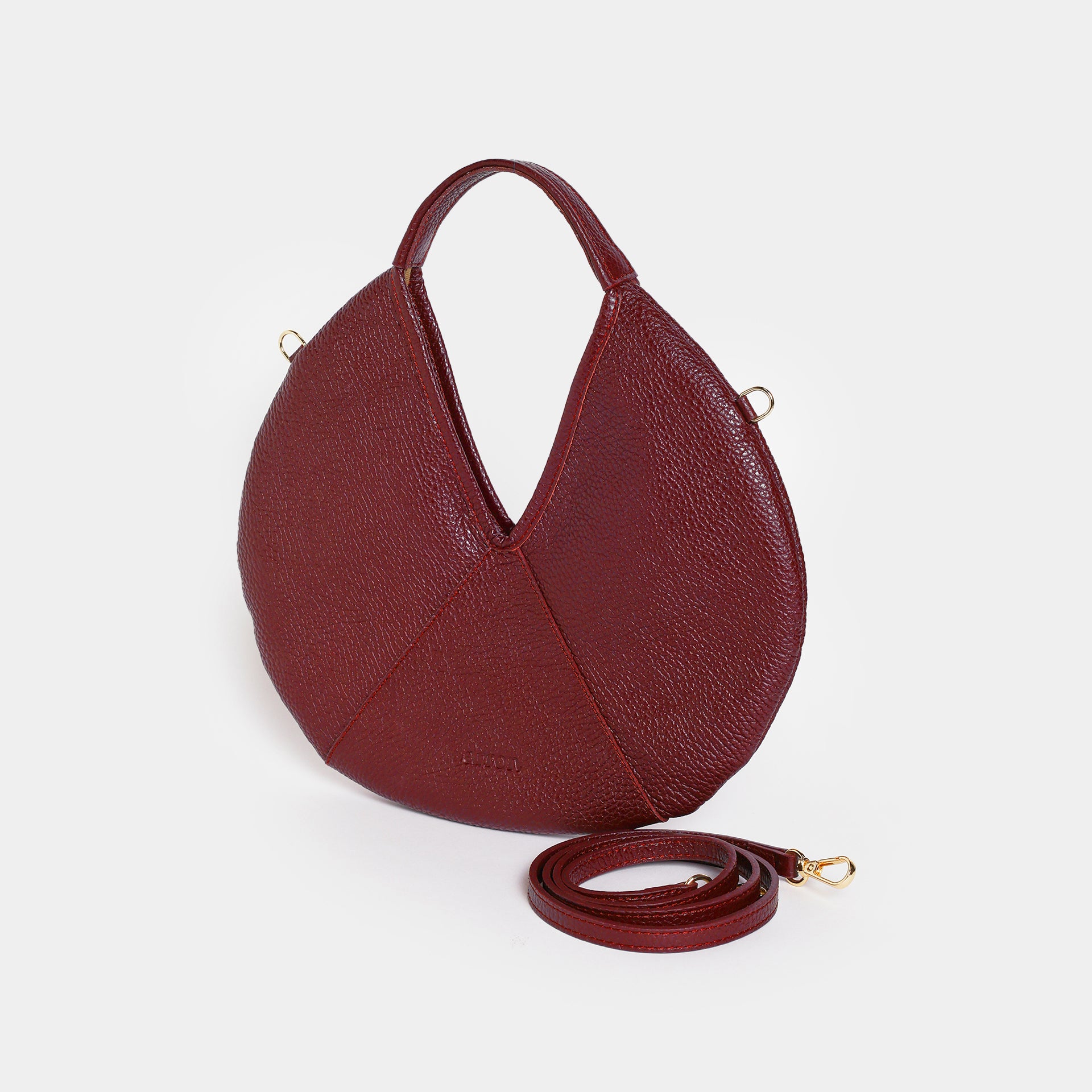 borsa rotonda piccola in pelle martellata bordeaux a tracolla brand Arron Made in Italy