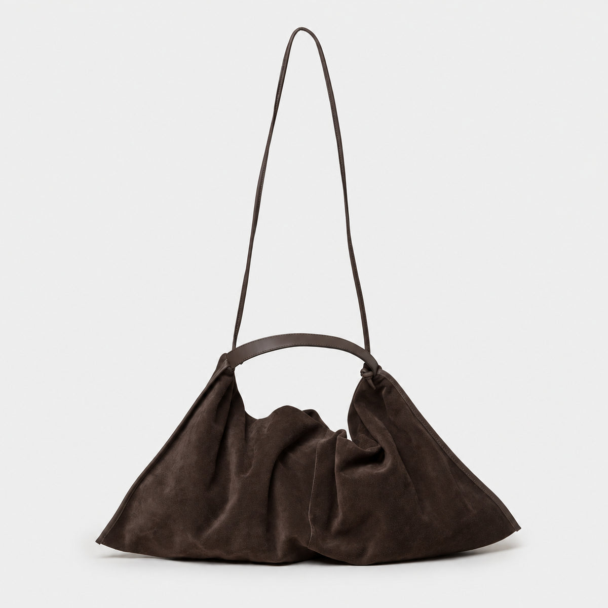 borsa Futura brand Arron in morbido camoscio forma destrutturata a tracolla e a mano forma contemporanea unica made in italy