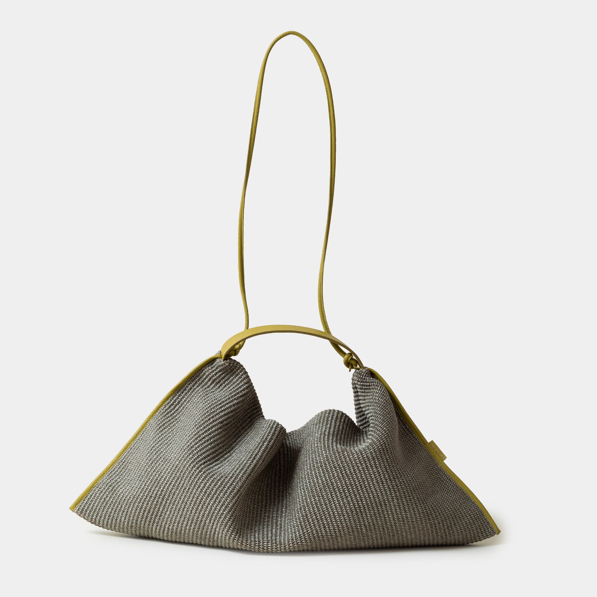 borsa Futura in rafia color muschio e profili in pelle mostarda destrutturata brand Arron Made in Italy 