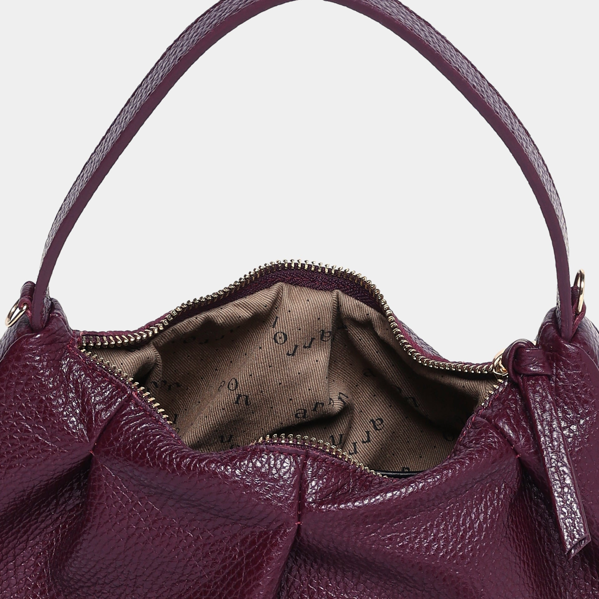 borsa piccola a tracolla pelle martellata dollaro burgundy bordeaux made in Italy brand Arron