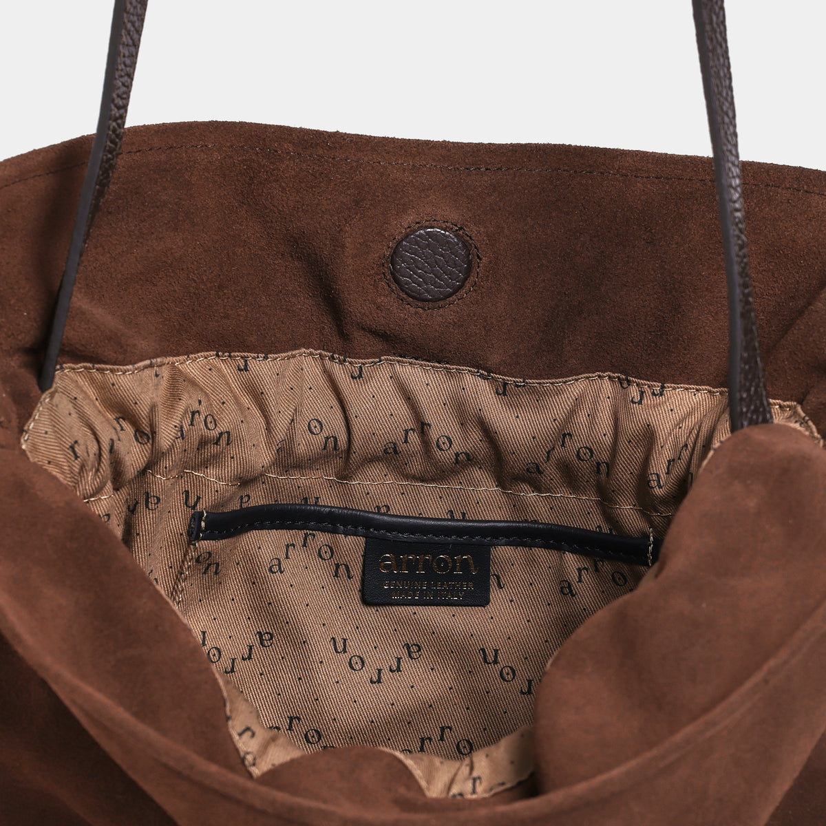 borsa a sacchetto morbida con coulisse con tracolla regolabile in camoscio cognac arron made in italy