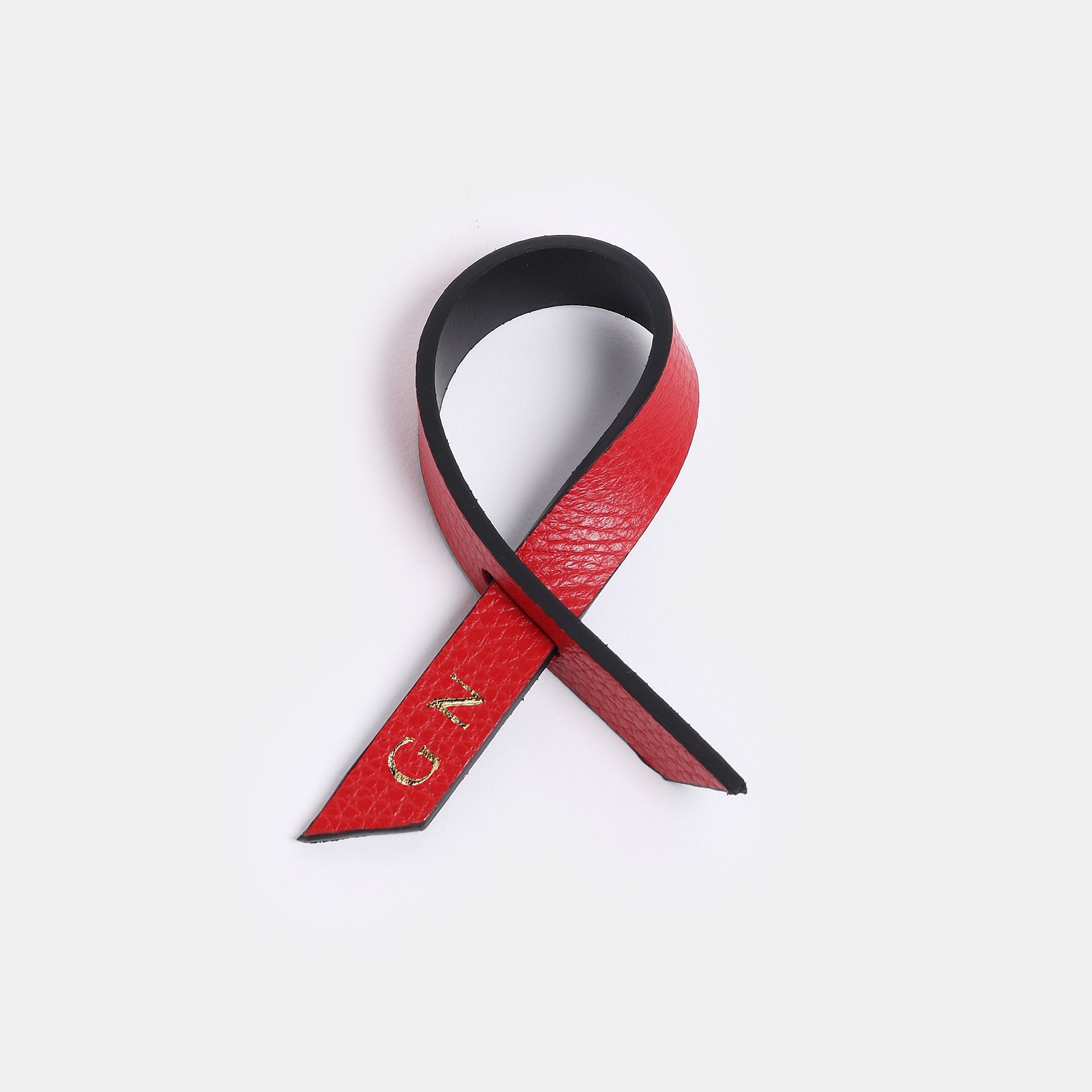 portatovaglio TILDE in pelle rossaqualità artigianale arron design minimale personalizzato con iniziali anche segnaposto
